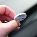 Included double-sided adhesive pad for securing the Fireball car fragrance diffuser to your dashboard or centre console.