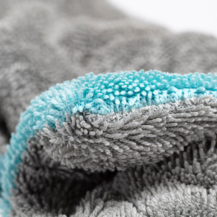  Corner detail of Rockcar Performer drying towel showing teal pile and grey edging