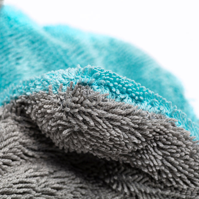 Macro shot of Rockcar Performer teal twisted loop microfiber pile